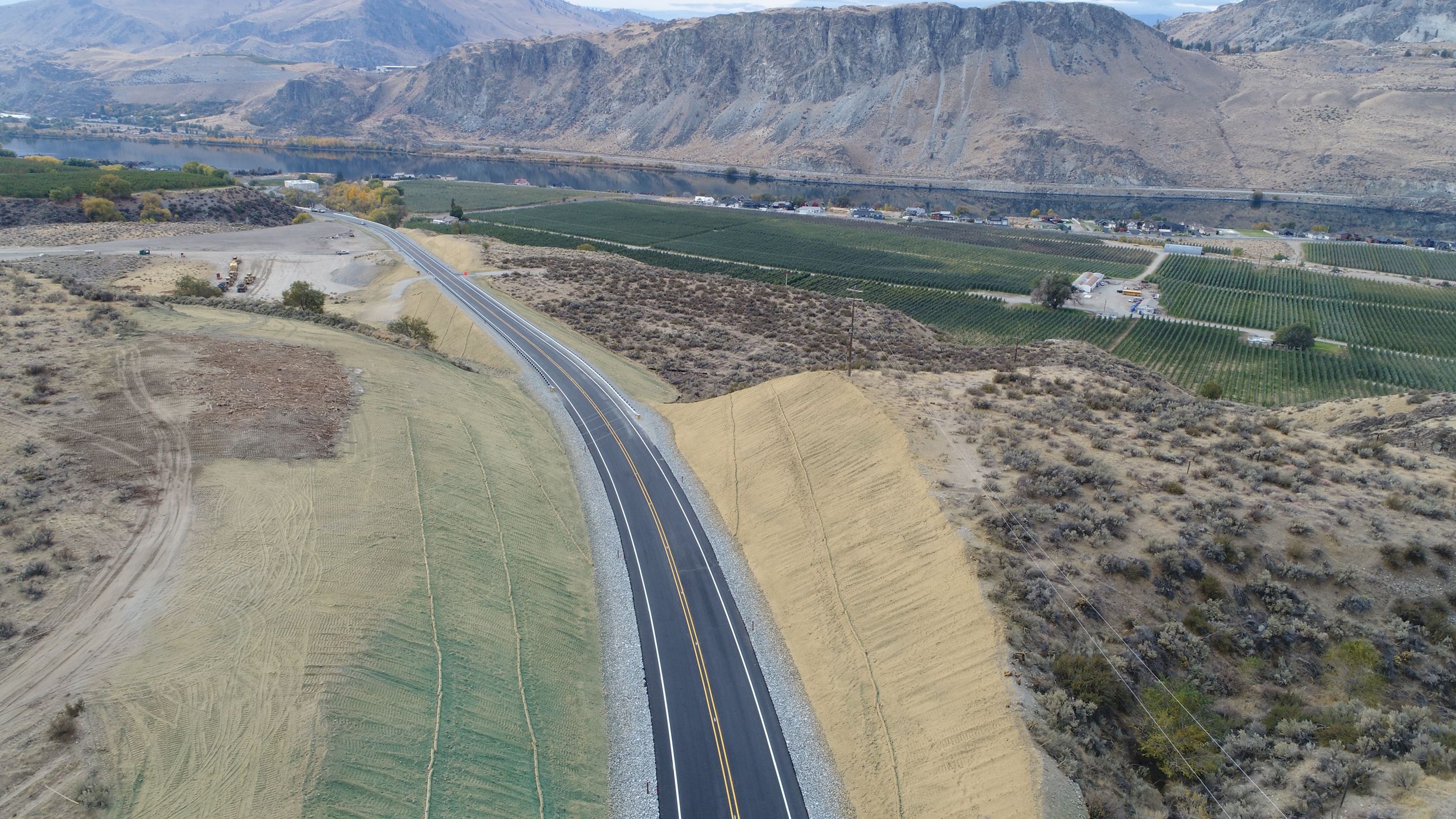 picture of roadway surrounded by hills