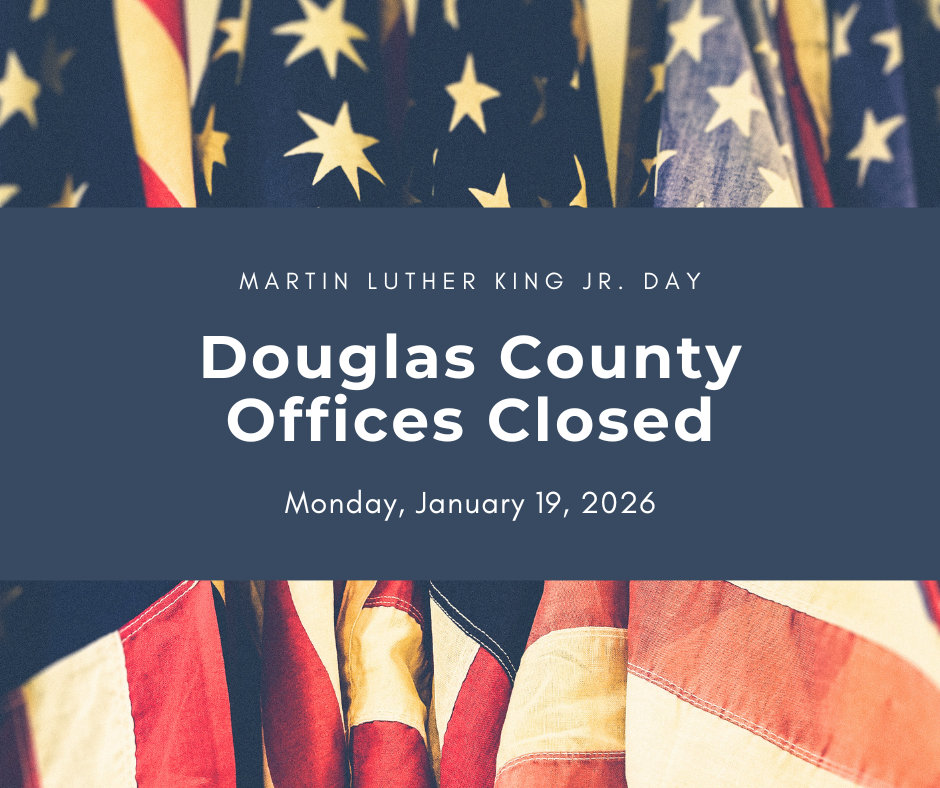 American Flags with notice of office closure for MLK Jr Day