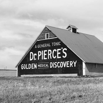 Black and white photo of a barn