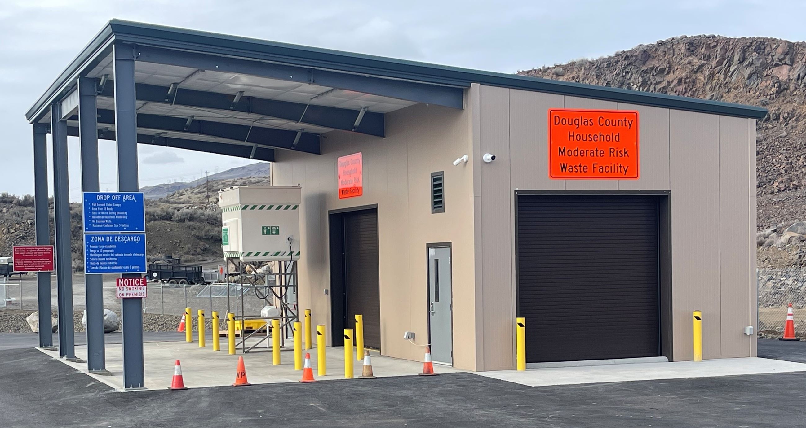picture of industrial building with cones around it 